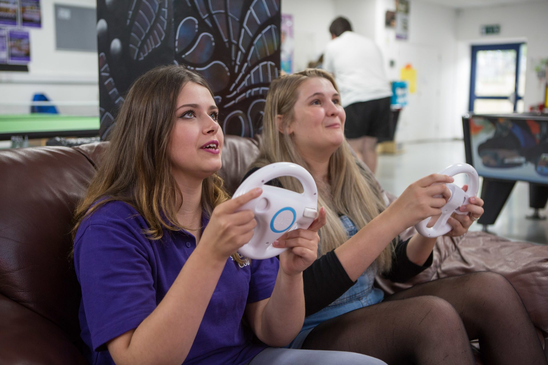 Students playing Wii in the student union common room