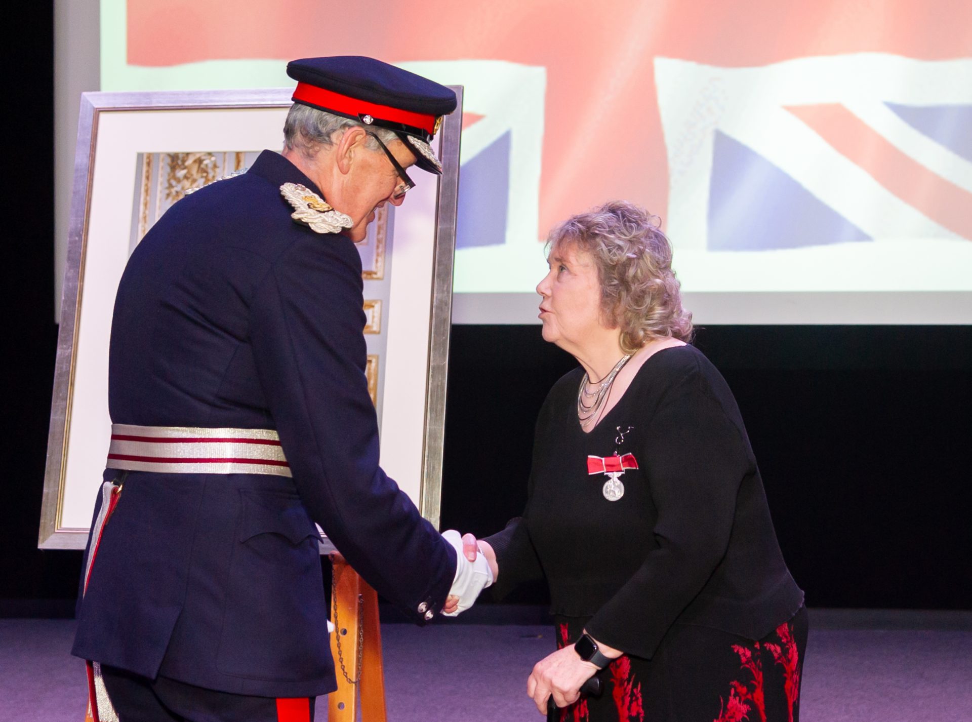 Janet Ellis receiving British Empire Medal for Service to Education