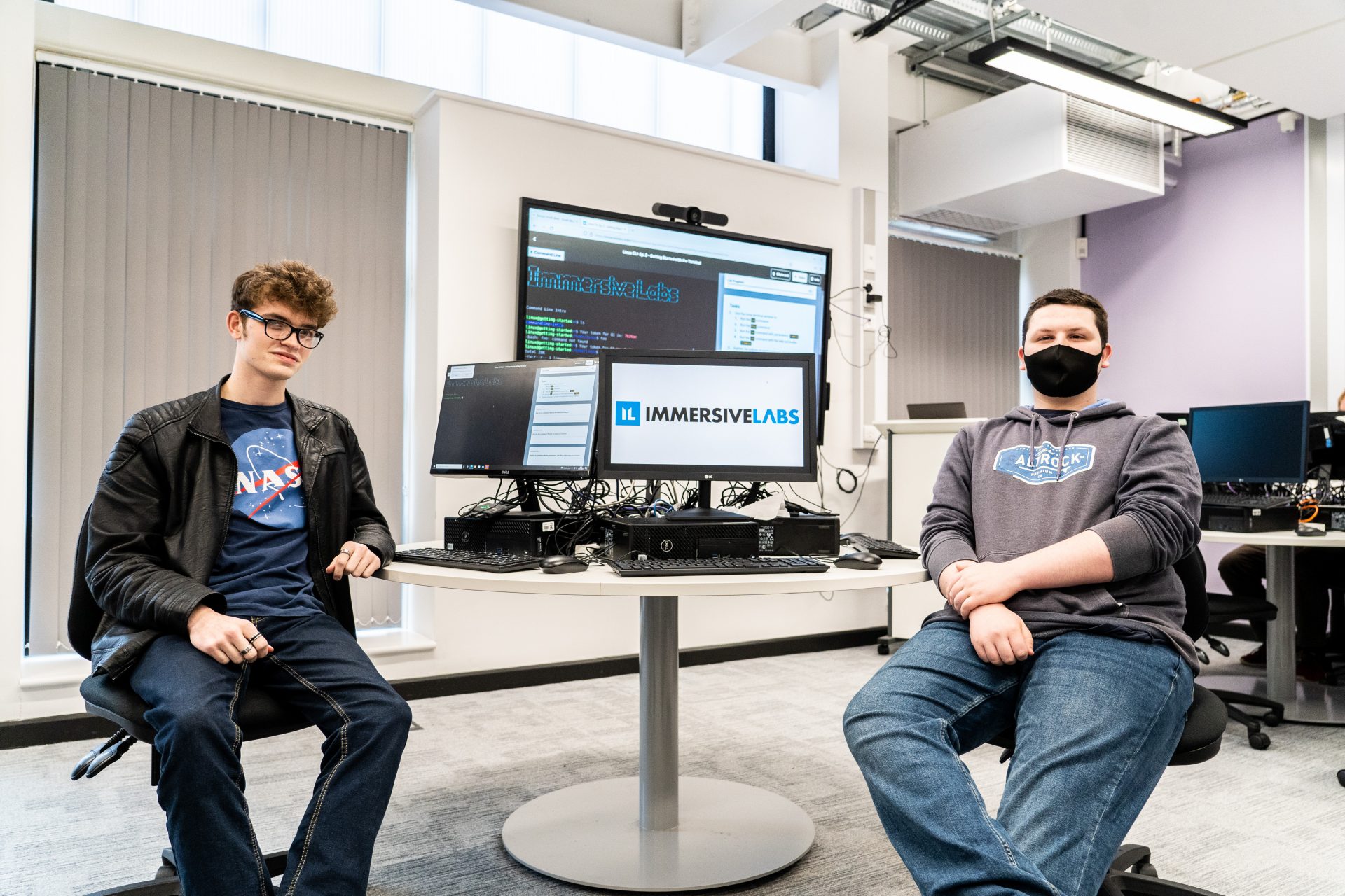 Students Eddie Meanley (left) and Connor Rosindale (right) find these cyber security workshops valuable