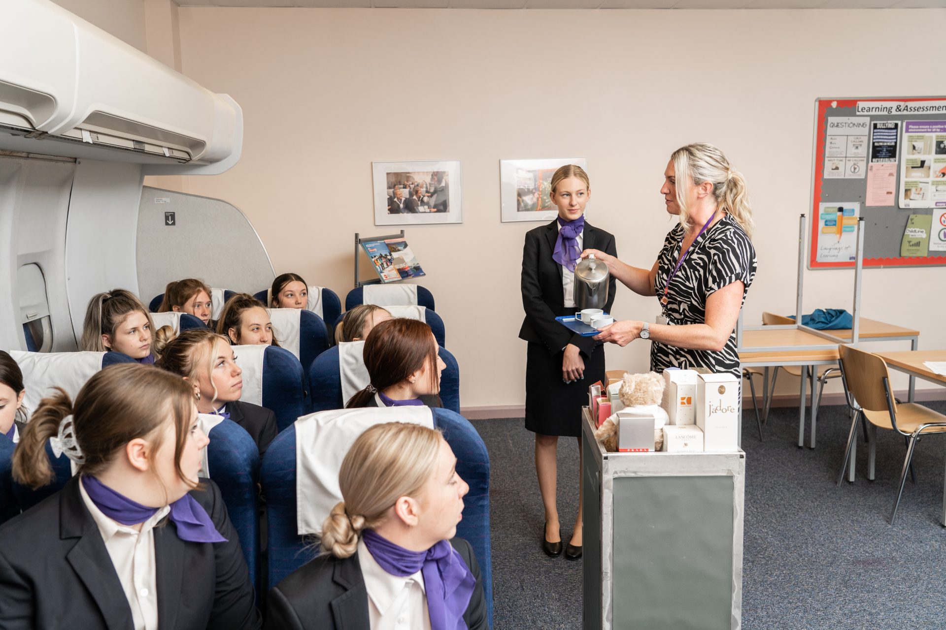 A class of students being taught the essentials for cabin crew roles