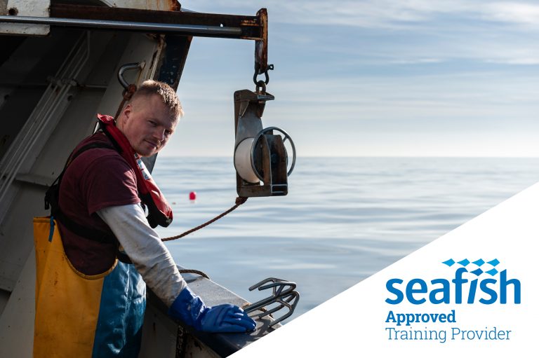 Fisher working on deck of vessel. Seafish Approved Training Provider logo.