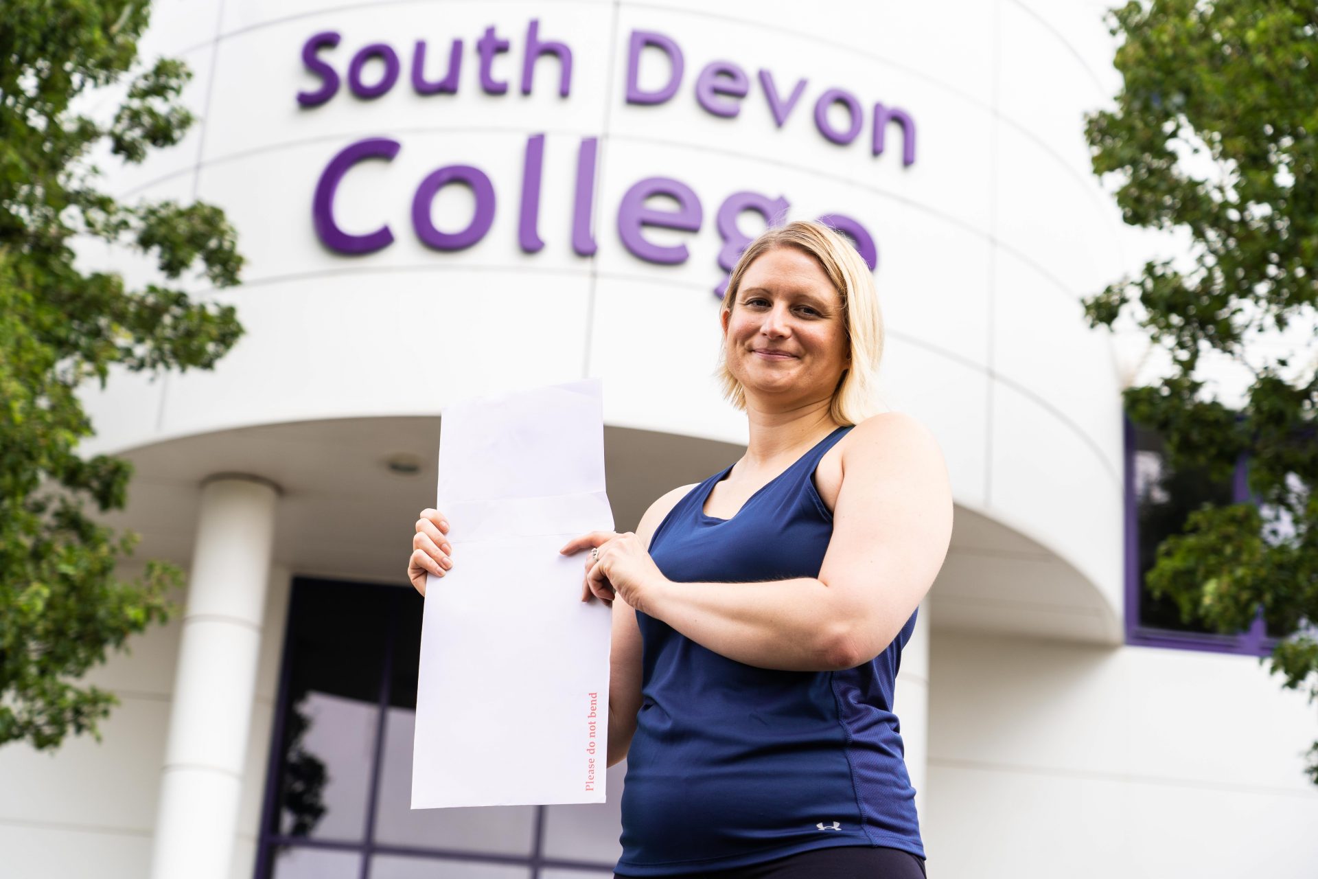 Adult GCSE student Kelly Maddick outside South Devon College with results