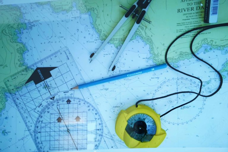 nautical map with navigational tools on top